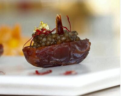 Caviar aux dattes at Beluga restaurant has medjool dates stuffed with caviar and garnished with saffron.