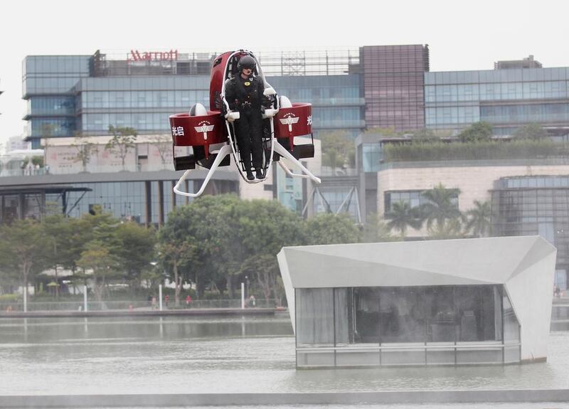 Michael Read, the director of flight operations at Martin Aircraft, flies on a Martin Jetpack in Shenzhen, China. KuangChi Science is backing the company. VCG / Getty 