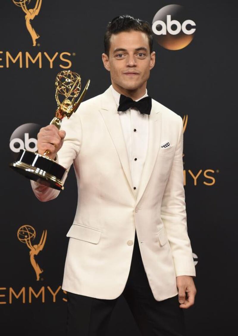 Rami Malek, winner of the award for outstanding lead actor in a drama series for Mr. Robot, poses in the press room. AP