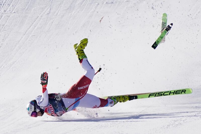 Switzerland's Urs Kryenbuhl crashes at the finish line of the men’s downhill World Cup in Kitzbuehel, Austria, on Friday, January 22. The 26-year-old was airlifted to hospital suffering from concussion, a broken collarbone and knee ligament injuries. AP