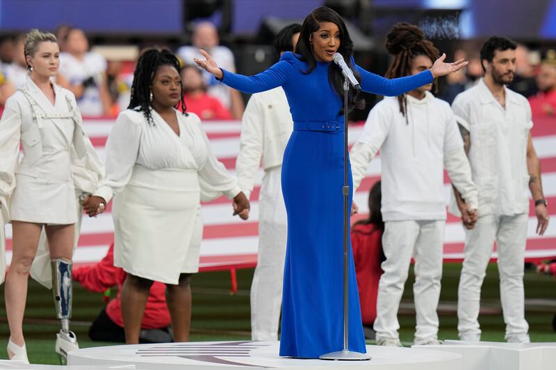 Country music artist Mickey Guyton performed the National Anthem before the NFL Super Bowl 56 football game between the Los Angeles Rams and the Cincinnati Bengals, on Sunday, Feb.  13, 2022, in Inglewood, California. AP