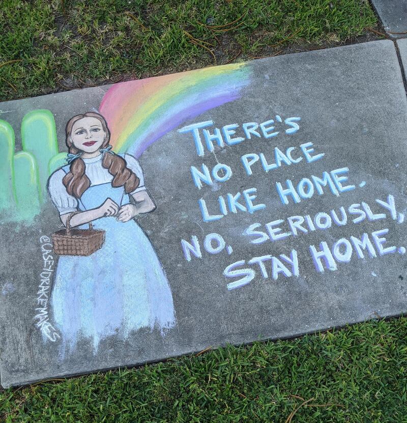 Drake's work shows Dorothy from the film 'The Wizard of Oz' with a message to stay home. Casey Drake