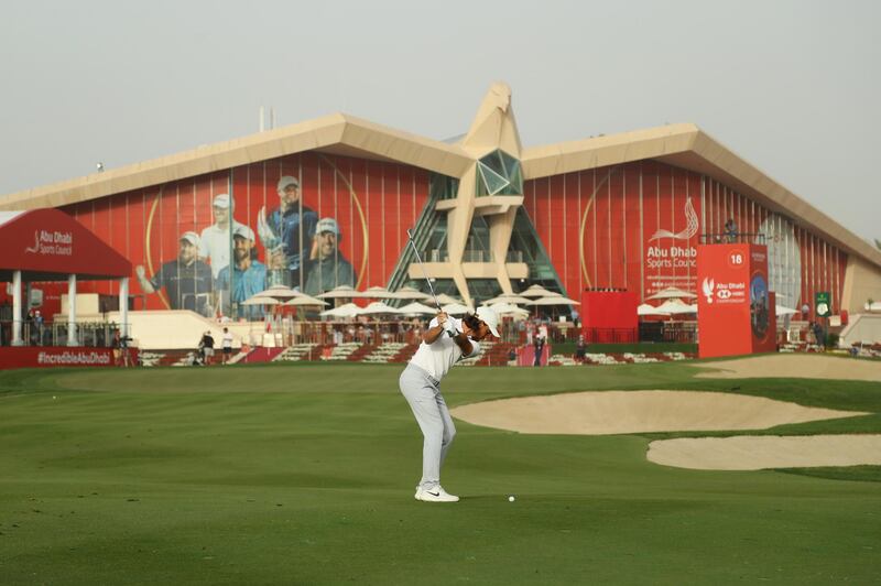 Tommy Fleetwood plays his third shot on the 18th hole during Day Three of the Abu Dhabi HSBC Championship. Getty Images