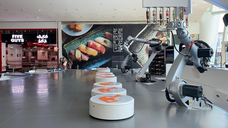 Robots are seen at a cafe in Dubai Festival City, United Arab Emirates February 7, 2021. Picture taken February 7, 2021. REUTERS/Abdel Hadi Ramahi