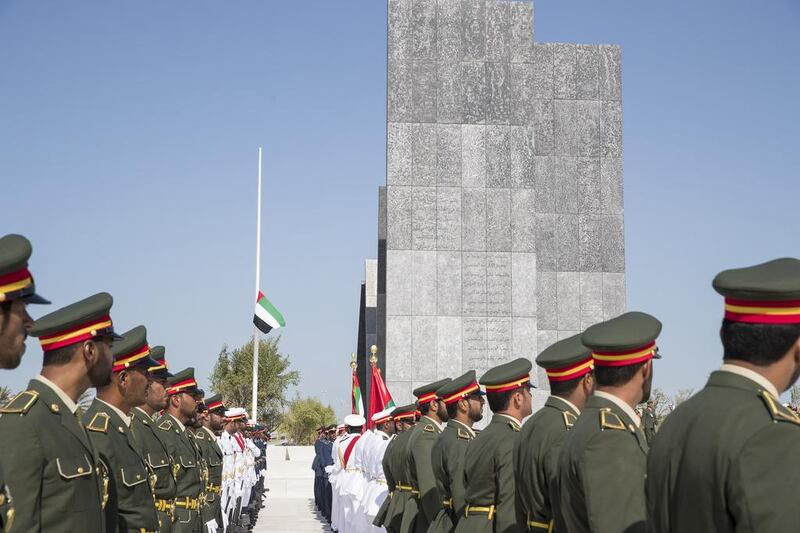 Members of the UAE Armed Forces participate in the Commemoration Day flag raising ceremony at Wahat Al Karama last year. Mohammed Al Hammadi / Crown Prince Court - Abu Dhabi