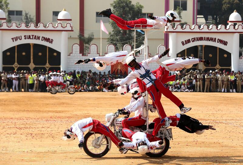 The Indian military's ASC Tornadoes daredevil bike team performs in Bangalore during India's 69th Republic Day celebrations on January 26, 2018. Republic Day marks India's adoption of its constitution after independence from British rule. Jagadeesh NV / EPA