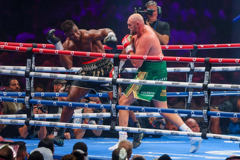 Tyson Fury and Francis Ngannou during their heavyweight boxing match in Riyadh. AFP
