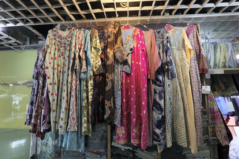 Abu Dhabi, United Arab Emirates - June 19, 2019: Thrift clothes shop Jamal Kamal ready made garments shop. Wednesday the 19th of June 2019. Hamdan Bin Mohammed Street, Abu Dhabi. Chris Whiteoak / The National