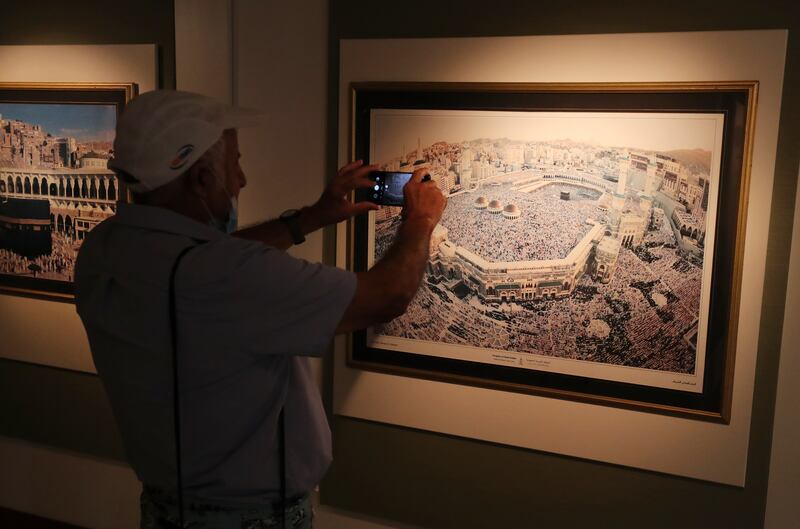 An exhibit with images of the Holy Mosque and Makkah Al Mukarramah, Saudi Arabia.