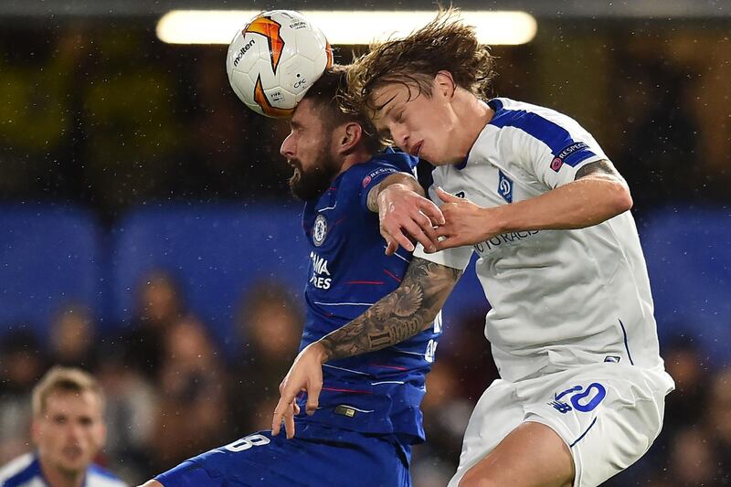 Chelsea striker Olivier Giroud vies with Dynamo Kiev defender Artem Shabanov.  AFP