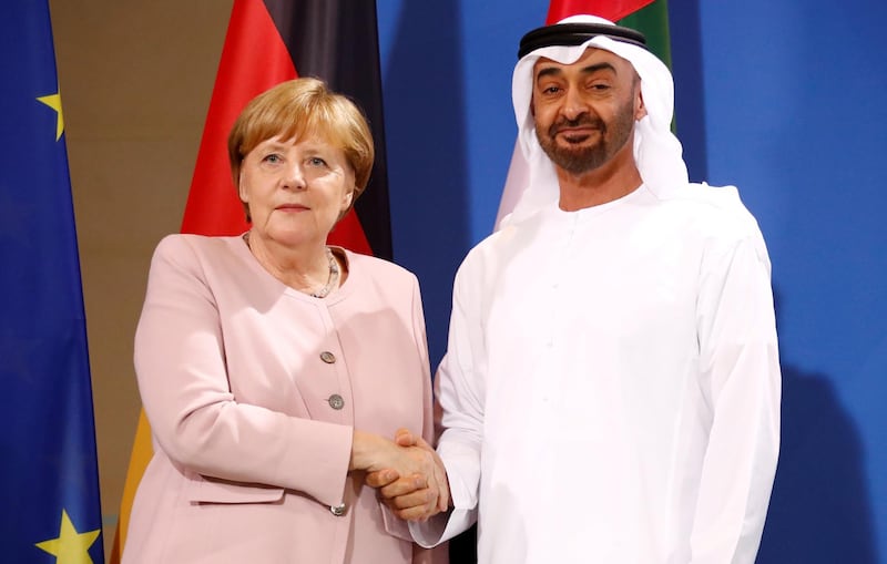 FILE PHOTO: German Chancellor Angela Merkel and Abu Dhabi's Crown Prince Mohammed bin Zayed al Nahyan shake hands after a news conference at the Chancellery in Berlin, Germany, June 12, 2019. REUTERS/Hannibal Hanschke/File Photo