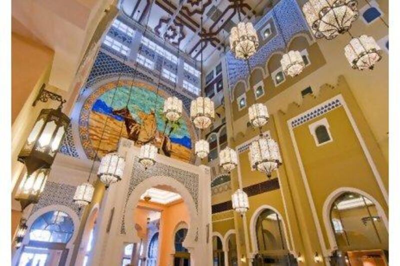 A mural of the Arab adventure Ibn Buttuta dominates an interior view of the Ibn Battuta Gate Movenpick Hotel. Charles Crowell for The National