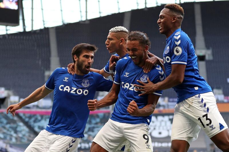 Everton striker Dominic Calvert-Lewin, centre, celebrates with teammates after scoring. AFP