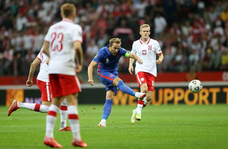 Harry Kane of England scores in the 72nd minute of their World Cup qualifying clash with Poland on Wednesday in Warsaw.  Reuters