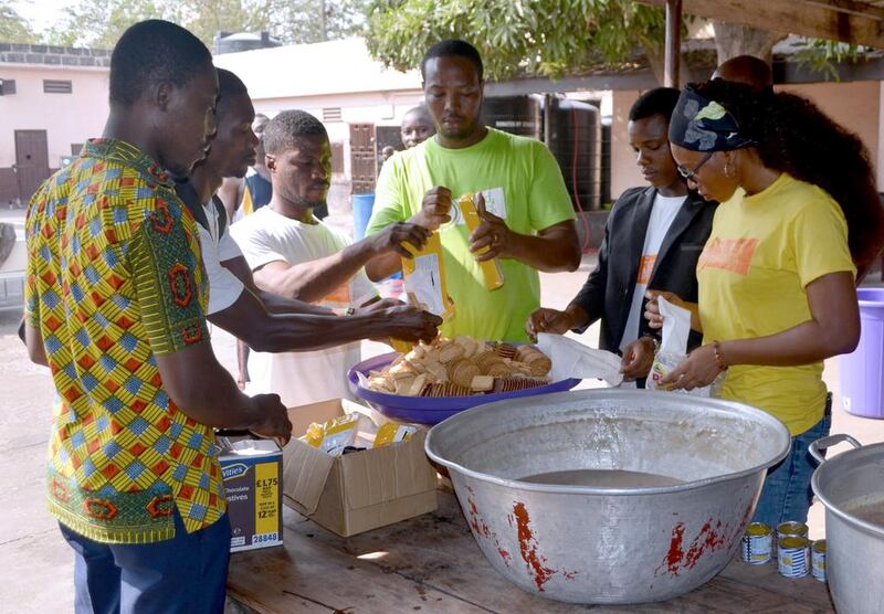 Volunteers from the charity "Food For All Ghana" prepare food on May 9, 2016 for patients at a hospital in Accra. Stacey Knott / Agence France-Presse

 

