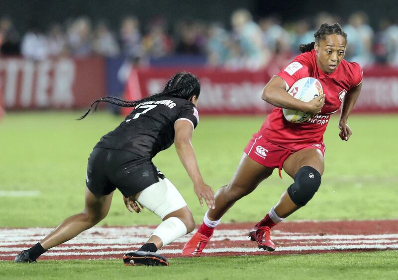 Dubai, United Arab Emirates - December 07, 2019: Charity Williams of Canada tries to get passed Tyla Nathan-Wong of New Zealand during the match between New Zealand and Canada in the womens final at the HSBC rugby sevens series 2020. Saturday, December 7th, 2019. The Sevens, Dubai. Chris Whiteoak / The National