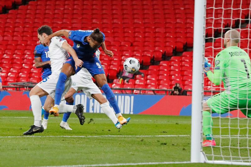Dominic Calvert-Lewin heads home England's second goal. AFP