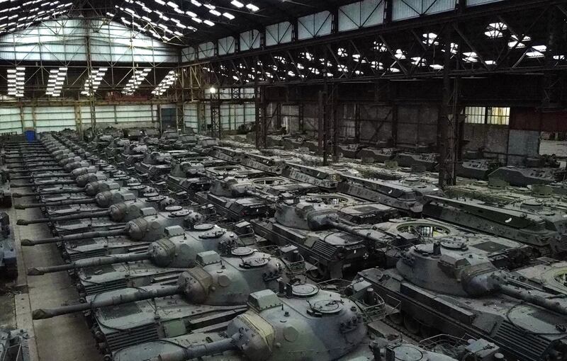 Leopard 1 tanks in a hangar in Tournais, Belgium. The tanks' owner says he will help Ukraine provided the Belgian regional government of Wallonia and Germany allow him to sell them. Reuters

