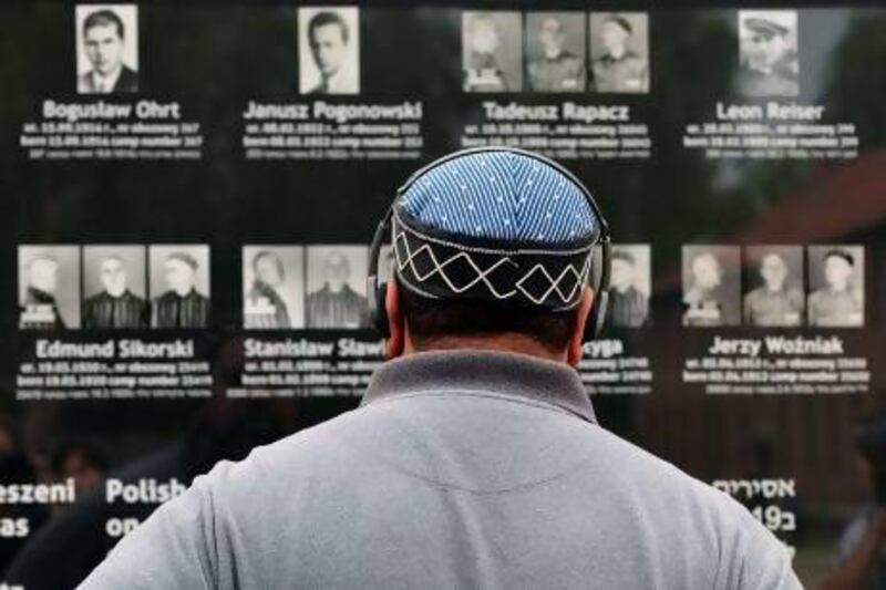 Imams from across the globe met with Holocaust survivors in an emotional encounter at Warsaw's synagogue, as part of an anti-genocide programme that includes a visit to Auschwitz.