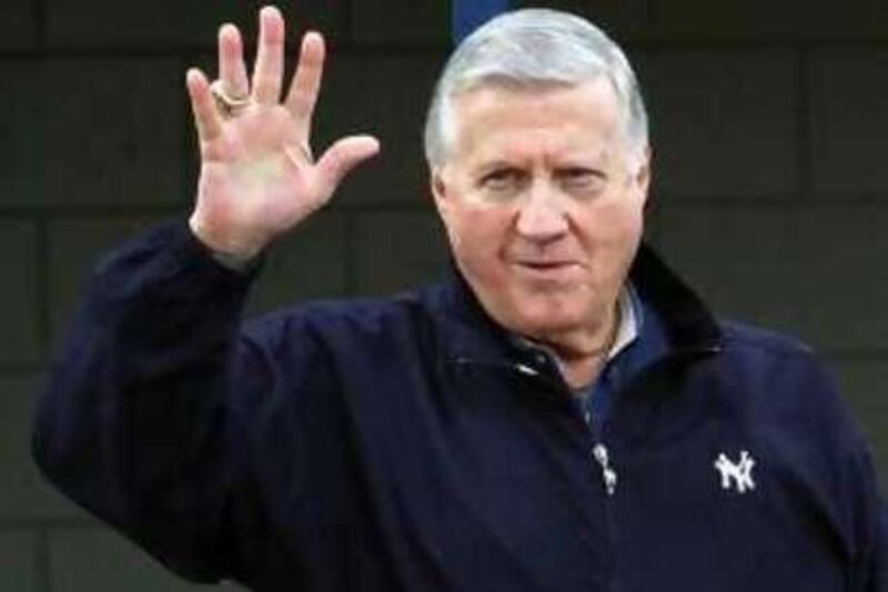 FILE - This feb. 17, 2003, file photo shows New York Yankees owner George Steinbrenner waving to fans in Tampa, Fla.  Steinbrenner, who rebuilt the New York Yankees into a sports empire with a mix of bluster and big bucks that polarized fans all across America, died Tuesday, July 13, 2010, in Tampa, Fla. He had just celebrated his 80th birthday July 4.  (AP Photo/Chris O'Meara, File) *** Local Caption ***  NYO317_Obit_Steinbrenner_Baseball.jpg