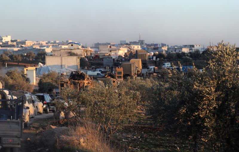 Turkish military vehicles enter the Bal al-Halwa crossing at the Syrian-Turkish, in Idlib governorate, Syria. REUTERS