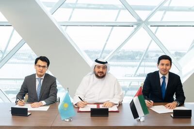 From left, Bagdat Mussin, Kazakhstan's Minister of Digital Development, Innovations and Aerospace Industry, Mohamed Alsuwaidi, Minister of Investment, and Nurlan Zhakupov, chairman of Samruk-Kazyna's management board, during the signing ceremony. Photo: Ministry of Investment