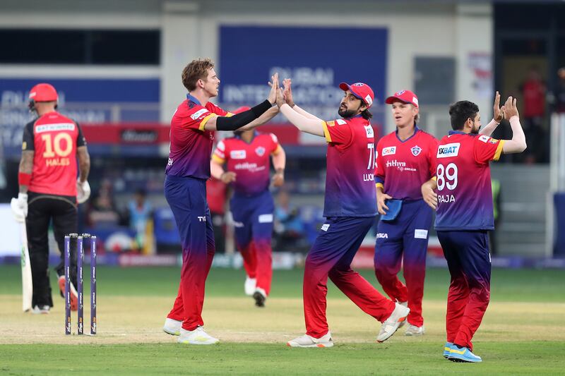 Dubai Capitals' Fred Klaassen celebrates the wicket of Alex Hales of Desert Vipers. 

