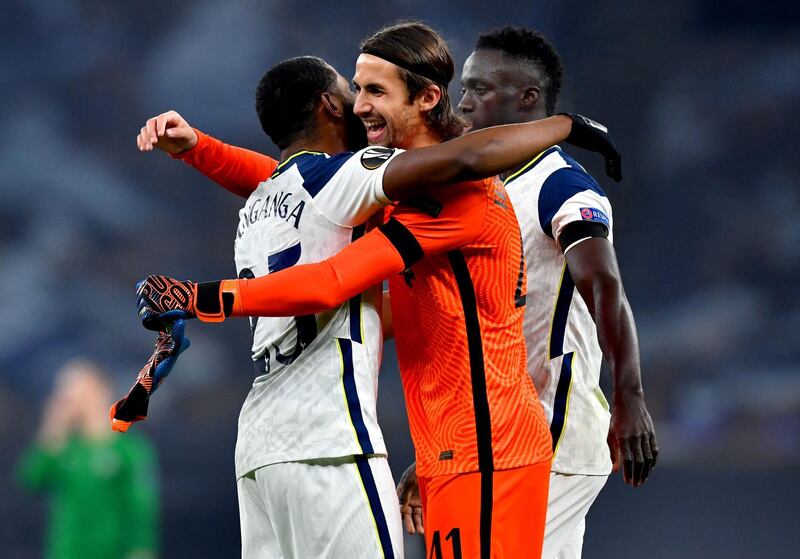 Tottenham Hotspur's Japhet Tanganga (left) hugs teammate Alfie Whiteman at the end of the UEFA Europa League Group J match at Tottenham Hotspur Stadium, London. PA Photo. Picture date: Thursday November 26, 2020. See PA story SOCCER Tottenham. Photo credit should read: Dylan Martinez/PA Wire. 

RESTRICTIONS:Editorial use only, no commercial use without prior consent from rights holder.