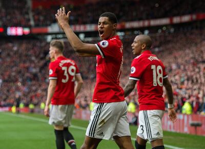 epa06593595 Marcus Rashford of Manchester United  celebrates scoring the second goal during the English Premier League soccer match between Manchester United and Liverpool held at the Old Trafford, Manchester, Britain,  10 March 2018.  EPA/PETER POWELL EDITORIAL USE ONLY. No use with unauthorized audio, video, data, fixture lists, club/league logos or 'live' services. Online in-match use limited to 75 images, no video emulation. No use in betting, games or single club/league/player publications