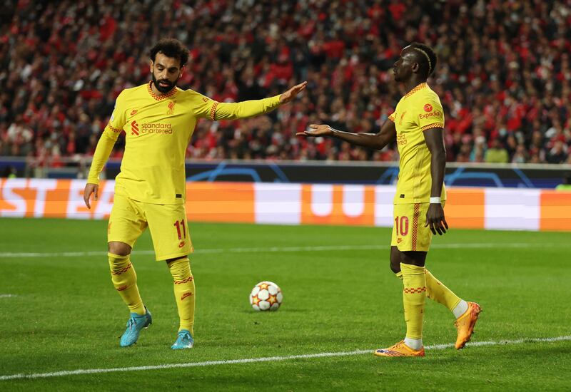 Sadio Mane celebrates scoring their second goal with Mohamed Salah. Action Images