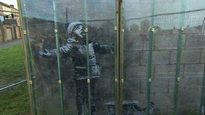 A protective plastic screen has been installed in front of Banksy's latest artwork, 'Season's Greetings'