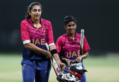 Captain Esha Oza, left, has called on the UAE to be 'fearless' in their remaining T20 World Cup qualifier match.  Chris Whiteoak / The National