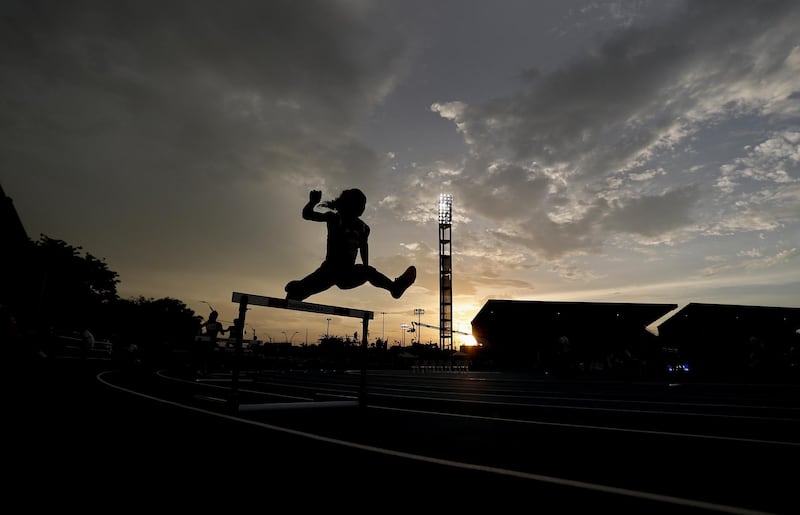 An athlete competes in women's 400m hurdles during the 23rd Central American and Caribbean Games, in Barranquilla, Colombia. Luis Eduardo Noriega A./EPA