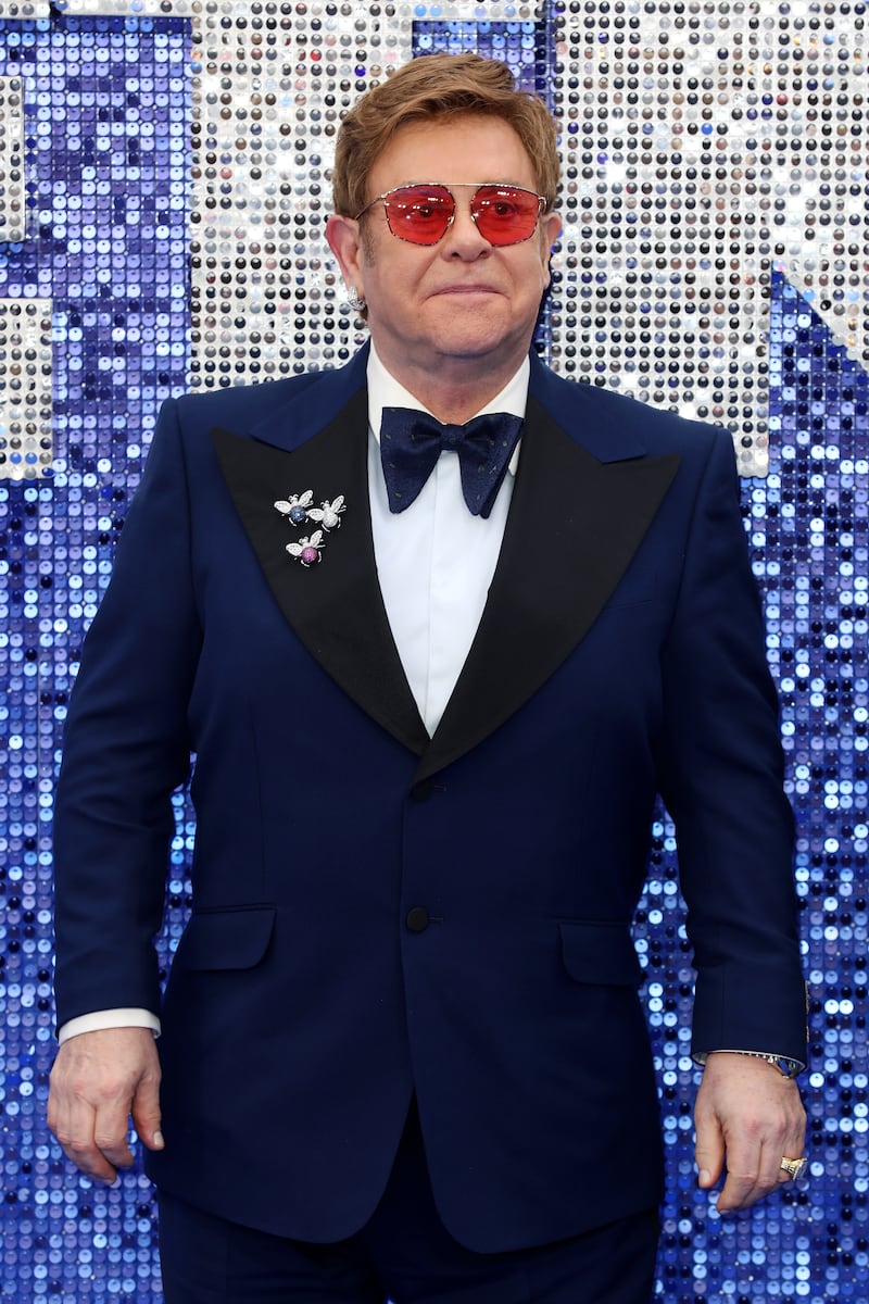 Elton John, in a navy tuxedo, attends the 'Rocketman' UK premiere at Odeon Luxe Leicester Square on May 20, 2019 in London, England. Getty Images