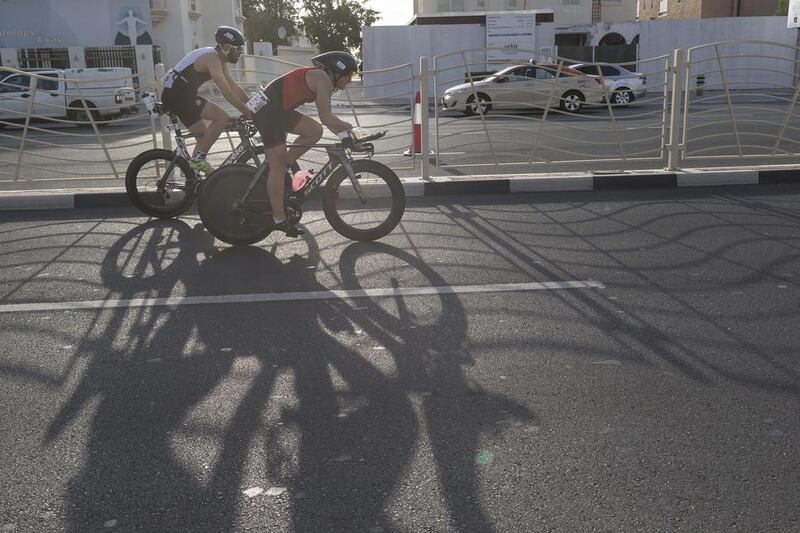 DUBAI, UNITED ARAB EMIRATES, 29 JANUARY 2016. The Ironman 70.3 Dubai Triathlon held on Sunset Beach next to the Burj Al Arab. General contestants take part in the cycle stage of the race. (Photo: Antonie Robertson/The National) ID: None. Journalist: None. Section: Sport.