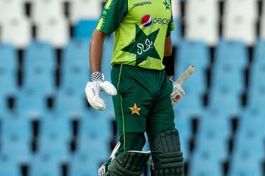 Pakistan's captain Babar Azam looks up after reaching a half century during the fourth T20 cricket match between South Africa and Pakistan at Centurion Park in Pretoria, South Africa, Wednesday, April 14, 2021. (AP Photo/Themba Hadebe)