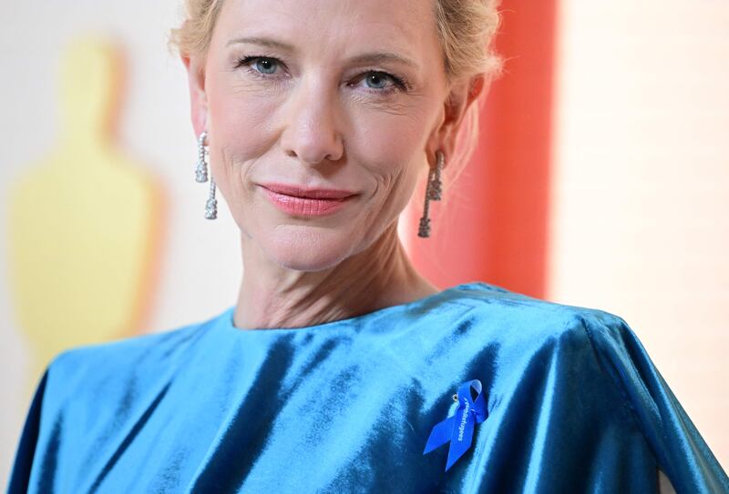 US-Australian actress Cate Blanchett wears a #WithRefugees blue ribbon the 95th Oscars ceremony. AFP