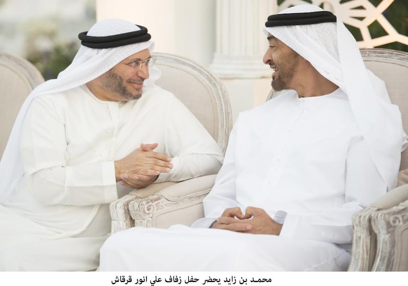 Sheikh Mohammed bin Zayed, Crown Prince of Abu Dhabi and Deputy Supreme Commander of the Armed Forces, speaks with Dr Anwar Gargash, Minister of State for Foreign Affairs, during the wedding reception of Ali Anwar Gargash (not shown).  Mohamed Al Suwaidi / Crown Prince Court - Abu Dhabi