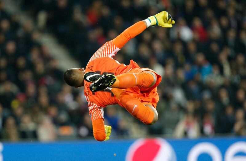 PSG goalkeeper Alphonse Areola goes for the ball during a Champions League Group B soccer match between Paris Saint-Germain and Anderlecht at Parc des Princes stadium in Paris, France, Tuesday, Oct. 31, 2017. (AP Photo/Thibault Camus)