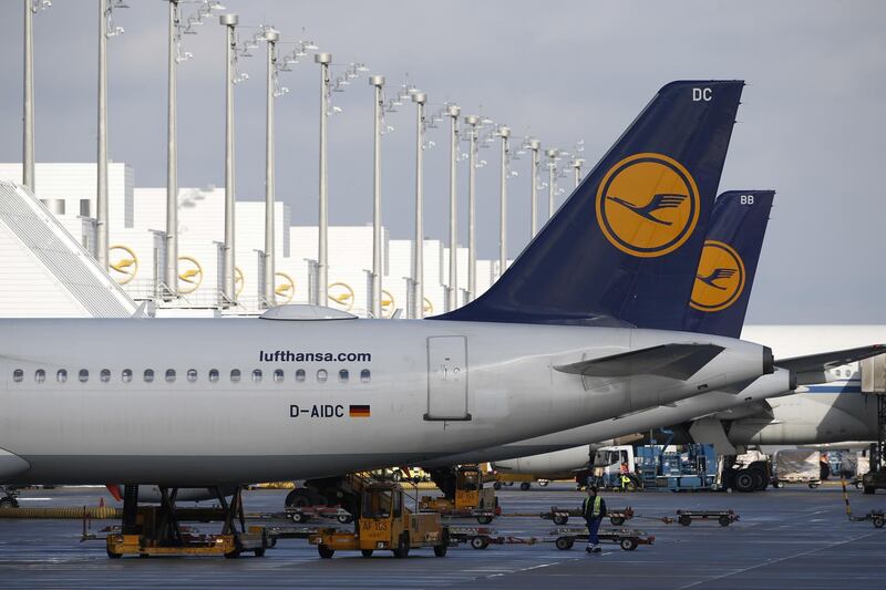 Aircraft operated by Deutsche Lufthansa AG stand at passenger boarding gates at Munich airport in Munich, Germany, on Tuesday, Jan. 29, 2019. Lufthansa has decided to speed up growth at Munich and develop it into a hub with a focus on Asia. Photographer: Michaela Handrek-Rehle/Bloomberg