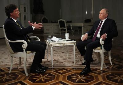 Russian President Vladimir Putin attends an interview with US journalist Tucker Carlson at the Kremlin in Moscow. EPA
