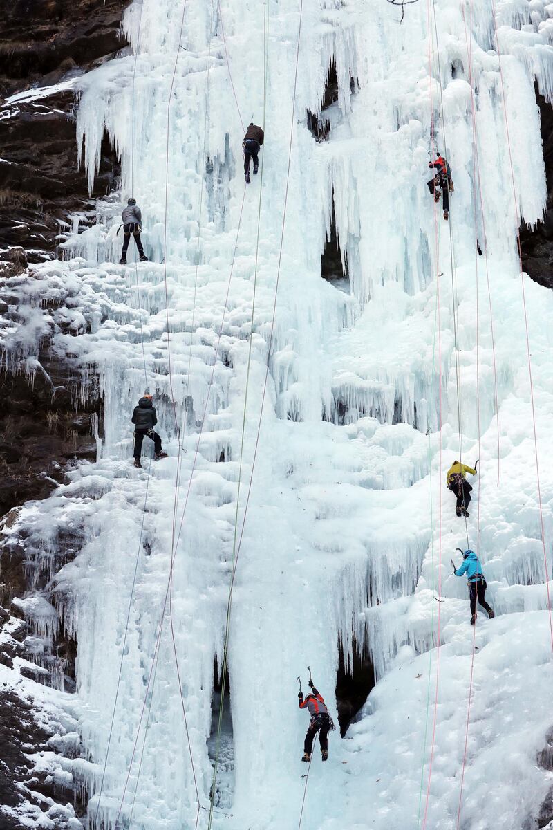 Climbers scale an ice cliff at the Gugok Waterfall in Chuncheon, 85 kilometres east of Seoul is hit by a cold wave. Yonhap / EPA