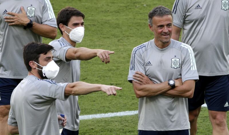 Spain coach Luis Enrique and his staff during a training session in Seville. EPA