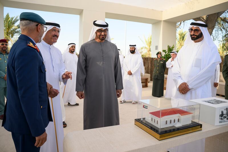 President Sheikh Mohamed bin Zayedat the unification ceremony at Abu Mreikhah with Sheikh Sultan bin Hamdan bin Mohamed, Adviser to the UAE President, second left, Mohamed Ahmad Al Bowardi, Minister of State for Defence Affairs, right,  and Maj Gen Essa Saif Al Mazrouei, Chief of Staff of the UAE Armed Forces