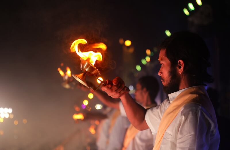 Indian devotees perform a Ganga aarti ritual at Sagar Island. EPA