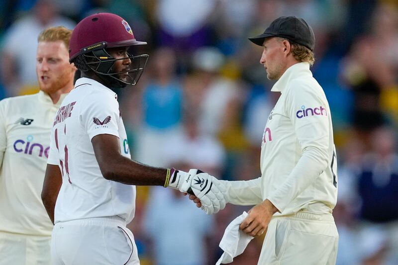 England captain Joe Root, right, shakes hands with West Indies' counterpart Kraigg Brathwaite at the end of day five of the second Test match at the Kensington Oval in Bridgetown, Barbados. AP Photo