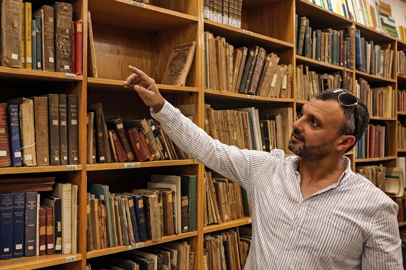 Rami Salameh is the restoration expert at the library