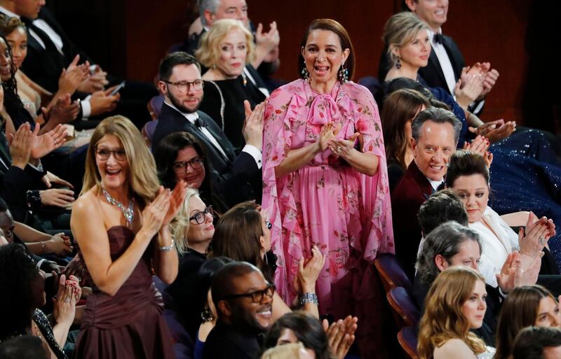 Maya Rudolph (R) and Laura Dern cheer as 'Period. End Of Sentence' wins. Photo: Reuters