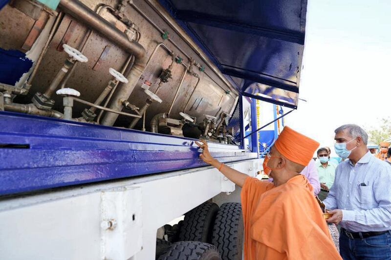 A priest offers a traditional Hindu prayer before a shipment of oxygen tanks and cylinders leaves Dubai for India to support hospitals reeling from oxygen shortages. Courtesy: Baps Hindu Mandir  