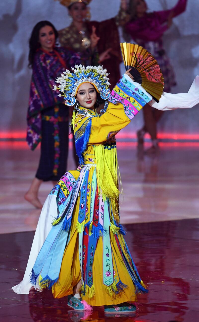 Miss China Li Peishan performs during the Miss World 2019 final in the ExCel centre in London. EPA